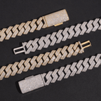 Diamond-encrusted gold and silver Cuban link bracelets on black background