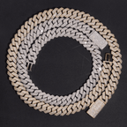 Iced out Cuban link chain necklaces in silver and gold on a black background