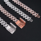 Diamond Cuban link bracelets in silver and rose gold with box clasps on black background