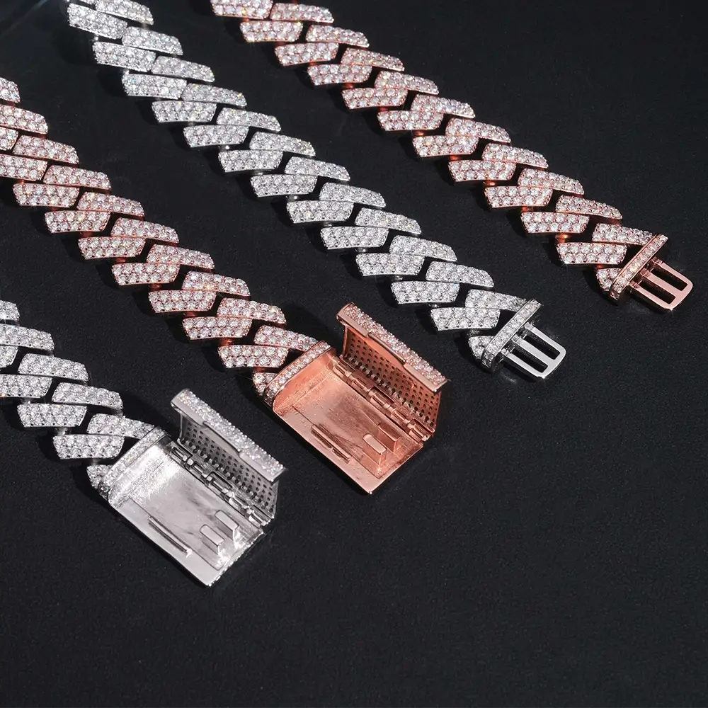 Diamond Cuban link bracelets in silver and rose gold with box clasps on black background