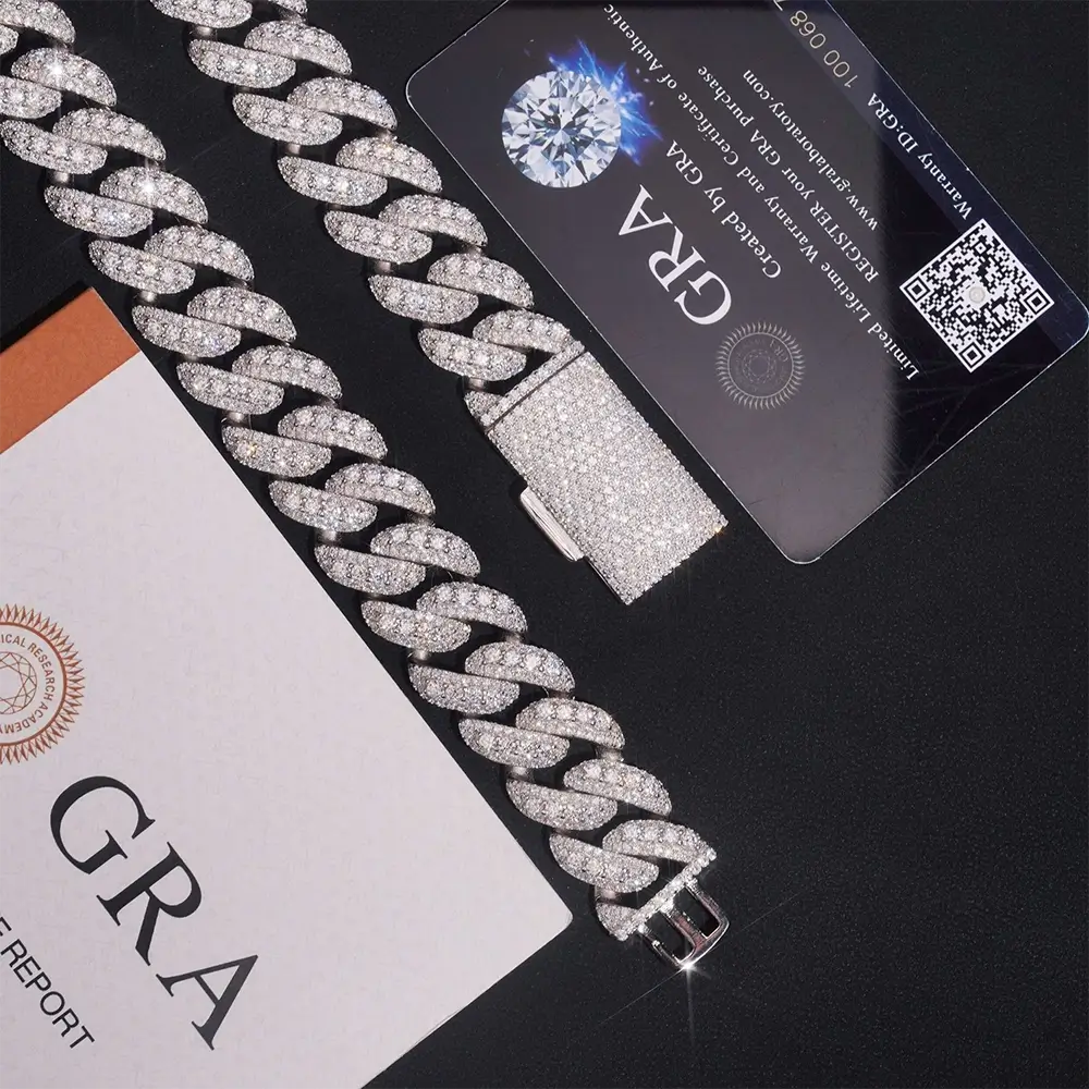 Iced out Cuban link chain bracelet with diamonds, jewelry certification cards on black background
