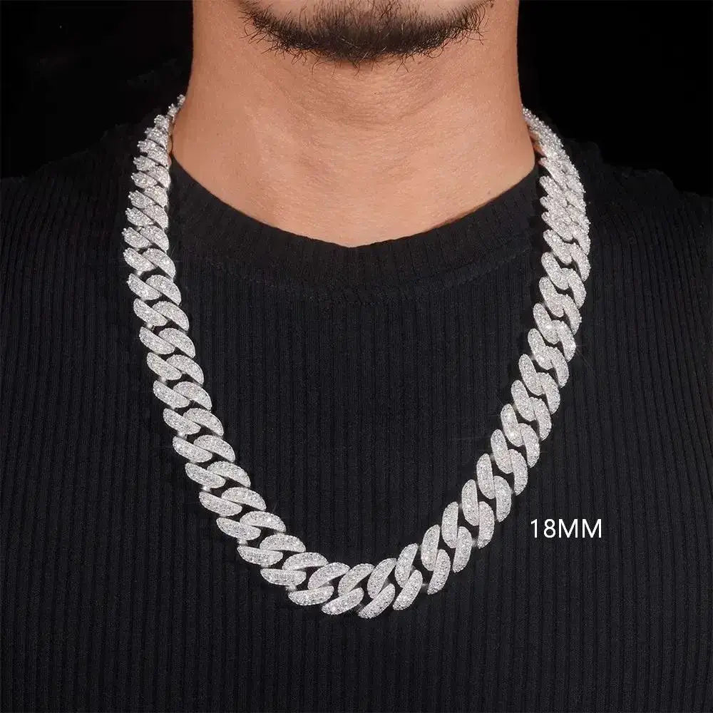 Man wearing an 18mm iced out Cuban link chain necklace over black shirt Main image