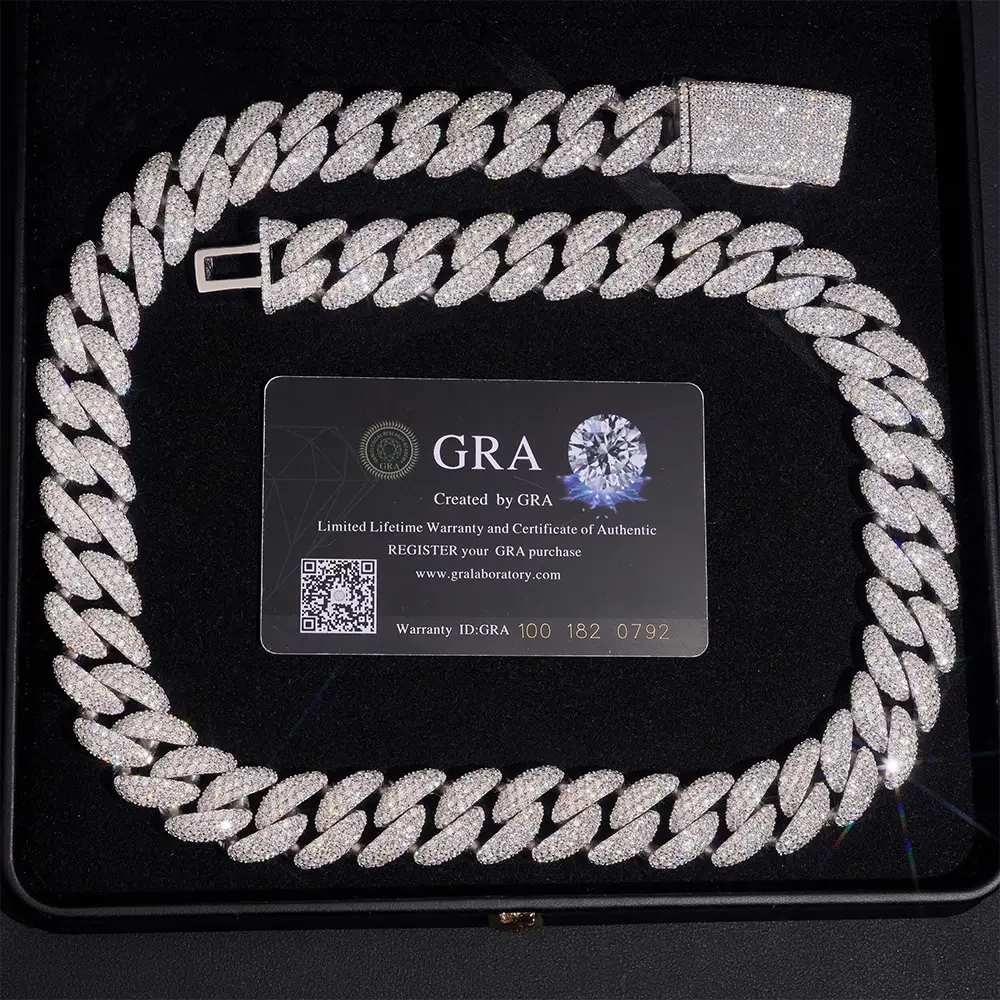 Iced out Cuban link chain necklace with cubic zirconia stones in a jewelry box, certificate included
