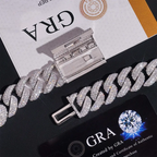close-up of iced out Cuban link chain with diamonds and certification cards