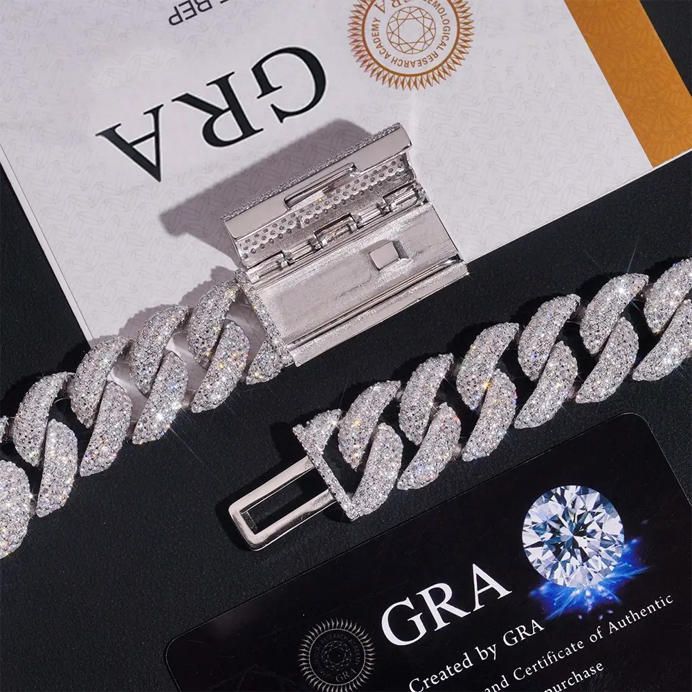 close-up of iced out Cuban link chain with diamonds and certification cards