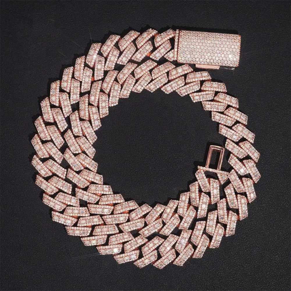 Rose gold Cuban link chain necklace with sparkling pavé stones on black background