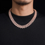 Diamond Cuban link chain necklace on man wearing black sweater