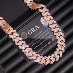 Rose gold iced out Cuban link chain necklace with diamonds on a black display
