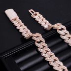 Rose gold Cuban link chain bracelet with sparkling crystals on black display