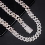 Iced out Cuban link chain necklace with crystal stones on black background